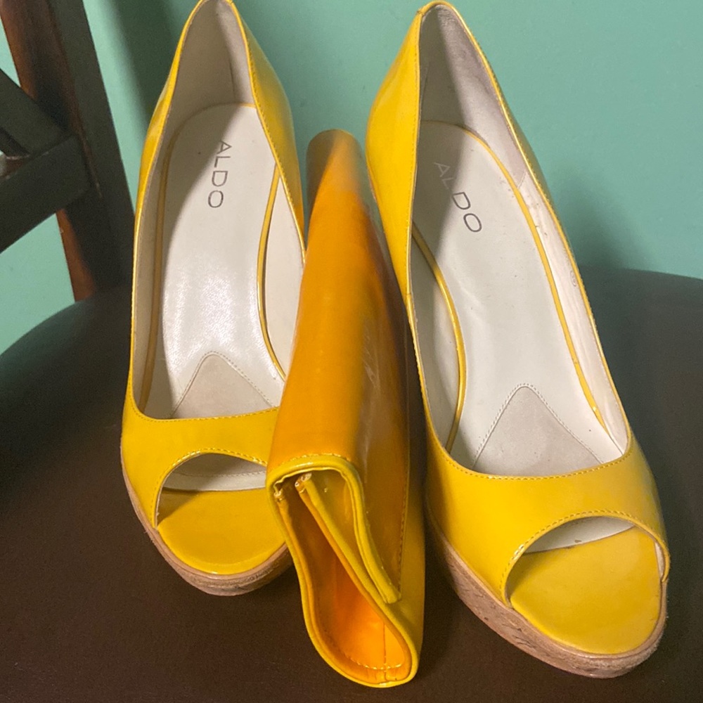 Aldo Bonou Yellow patent leather wedges with matching purse as a set.